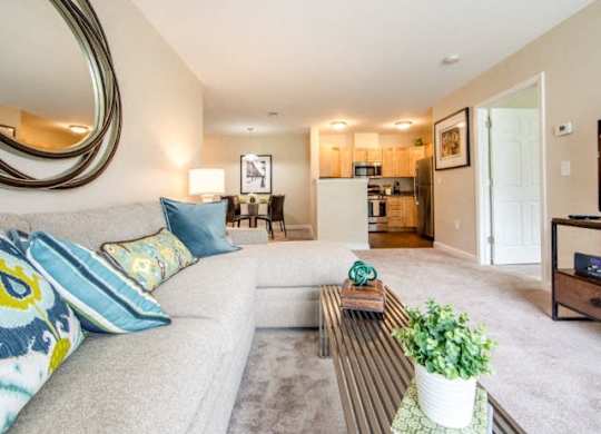 a living room with a couch and a coffee table