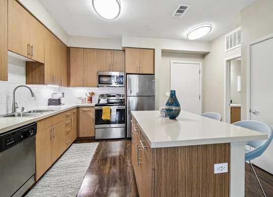 A kitchen with wooden cabinets and a white countertop.