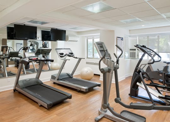 Fitness center with treadmills, machines, and free weights at 2100 Connecticut, Washington, DC