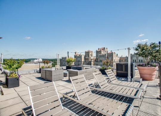 Rooftop deck with reclining lounge chairs at 2100 Connecticut, Washington