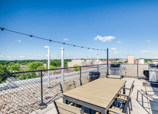 Rooftop deck with tables and seating at 2100 Connecticut, Washington, 20008