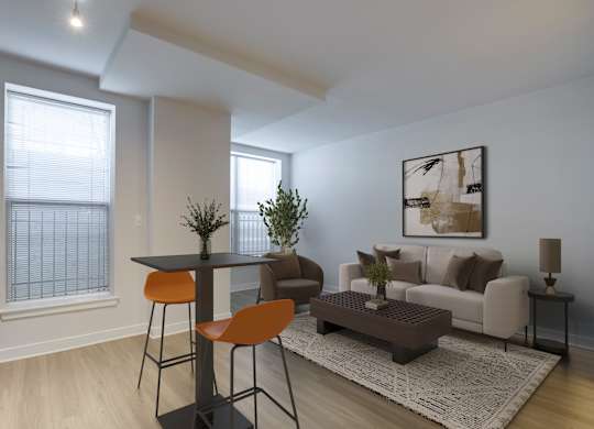 A modern living room with a dining area and a couch.