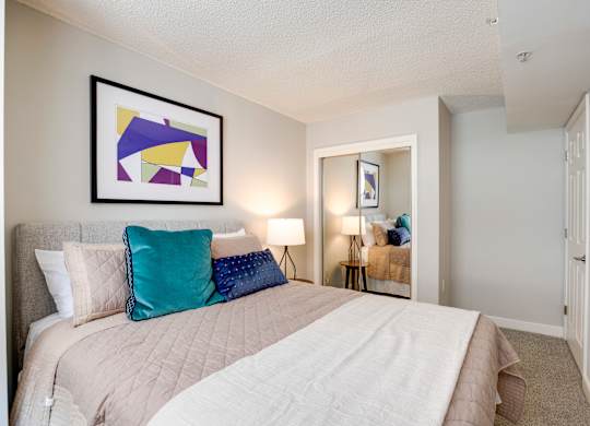 A model bedroom at West End Residences, Washington 20037