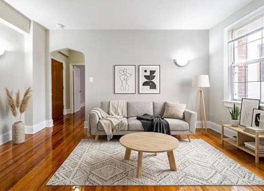 Living room with Scandinavian furnishings at The Paramount Apartments in the Petworth neighborhood in Washington, DC 20011