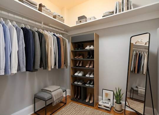 Walk-in closet (virtually staged) for studio apartment at 4115 Wisconsin Avenue Apartments in Washington, DC 20016