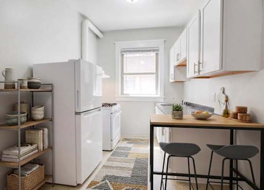 Kitchen (virtually staged) at 4115 Wisconsin Avenue Apartments in the Tenleytown neighborhood in Washington, DC 20016
