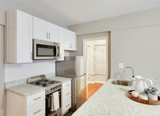 Updated kitchen with stainless steel appliances at The York and Potomac Park, Washington, 20006