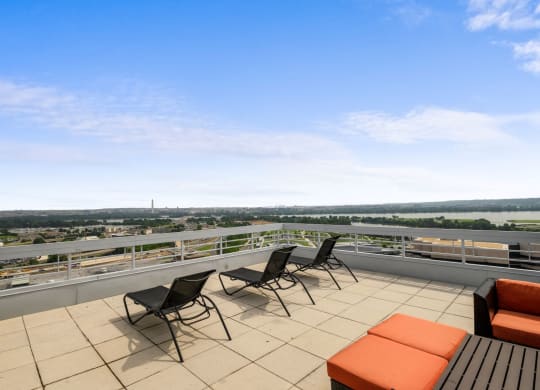 Rooftop deck with lounge chairs at Lenox Club, National Landing, Arlington, Virginia, 22202