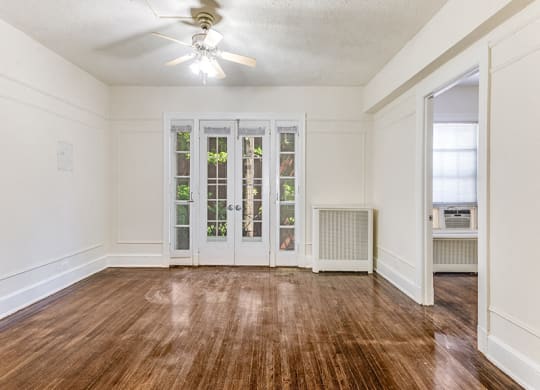 One-bedroom apartment living area at Highview and Castle Manor, Washington