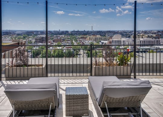 Rooftop deck with lounge chairs at Highview and Castle Manor, Washington, 20009