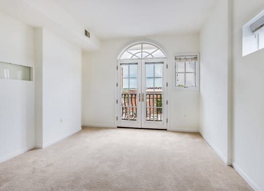 Apartment bedroom with balcony at Kalorama Park, Washington, DC 20009
