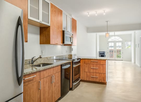 Renovated kitchen with granite at Kalorama Park, Washington, DC 20009countertops and stainless steel appliances