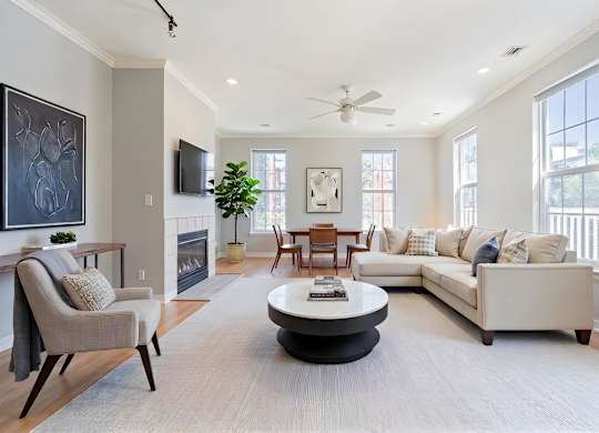 A living area with fireplace at The Residences at King Farm
