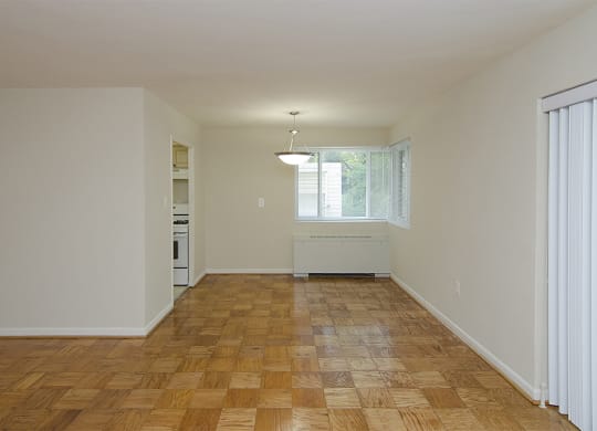 One-bedroom living and dining at Legation House in Washington, DC 20015