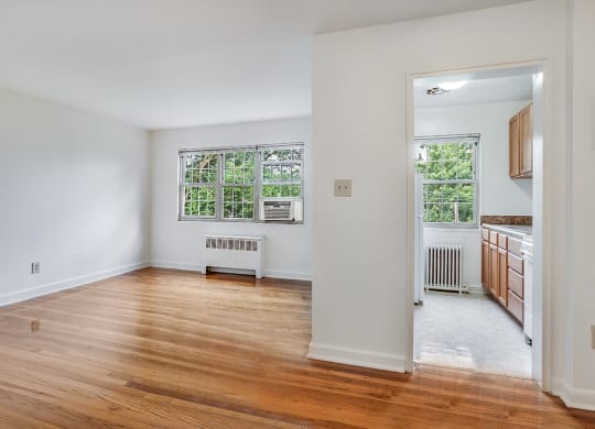 Apartment living area and kitchen at Mason Hall in Alexandria, VA 22314