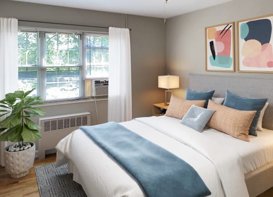 Apartment bedroom (virtually staged) at Mason Hall in Alexandria, VA 22314