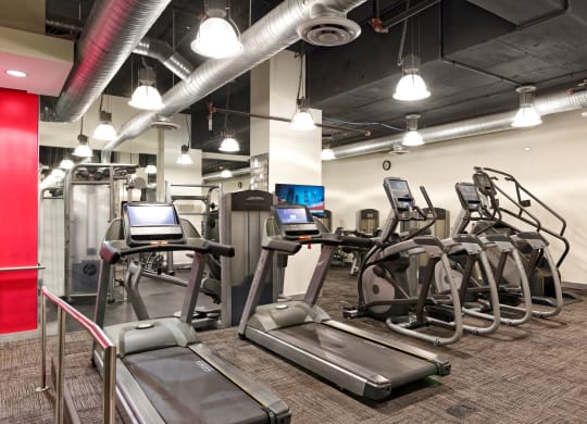 Fitness center with cardio machines at Park Place at Petworth, Washington, 20011