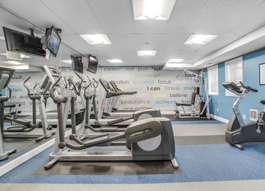 Fitness center with treadmills, machines and free weights at President Madison, Washington, Washington
