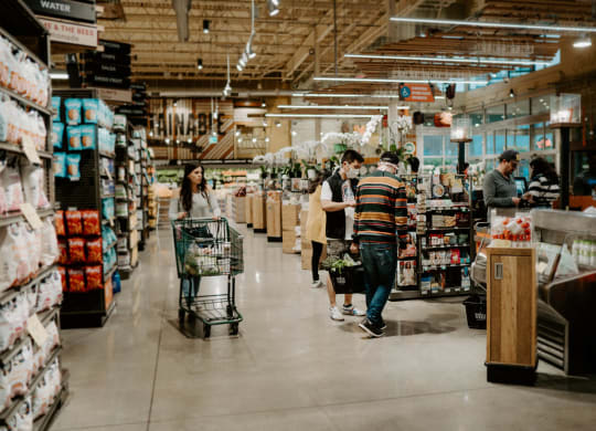 people shopping in a supermarket at The Shay, Washington, DC