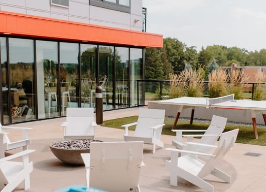Outdoor courtyard with fire pit at Hello Apartments, Minnesota, 55427