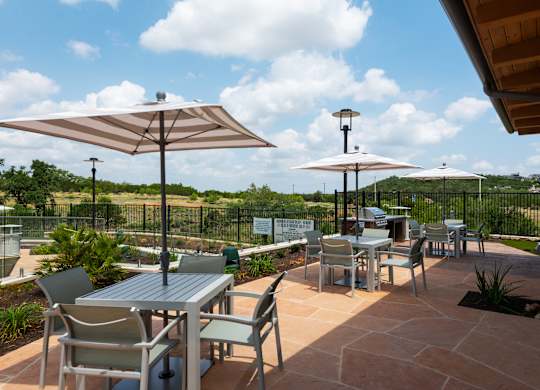 Outdoor Grilling Area and Tables at The Artesian at Bee Cave