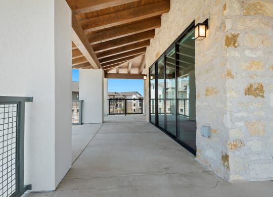 the preserve at ballantyne commons office lobby with glass windows and concrete floors