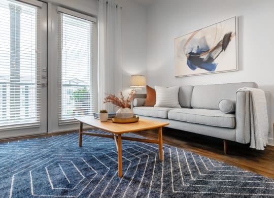 a living room with a couch and a coffee table