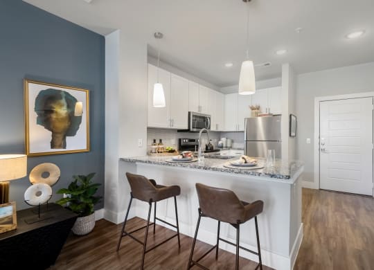 The Atwater Apartments Kitchen With Bar Seating