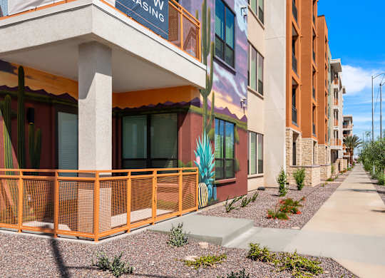 A street view of a building with a sign that reads