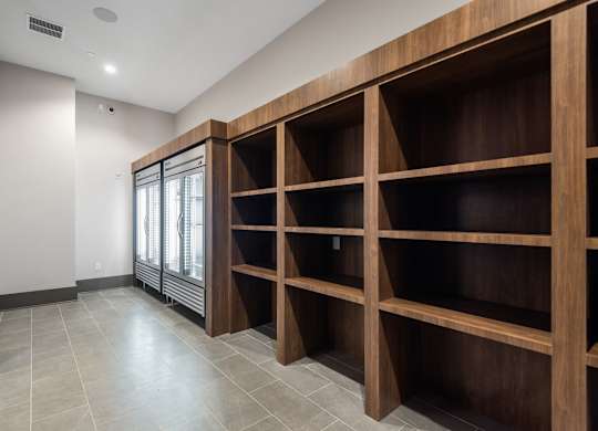 a modern and funky half bathroom reveal with black and white tile in a modern laundry room