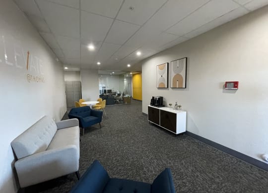 a large room with couches and chairs