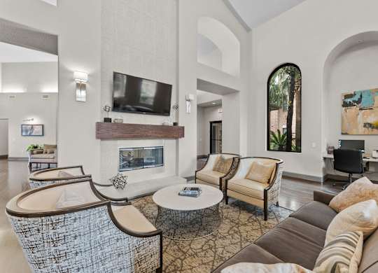 Spacious living room with fireplace and high ceilings at Melia Medical Center Apartments, Houston