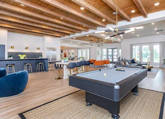 Clubhouse lounge with pool table and seating at Sienna at Westover Hills Apartments, San Antonio, 78253