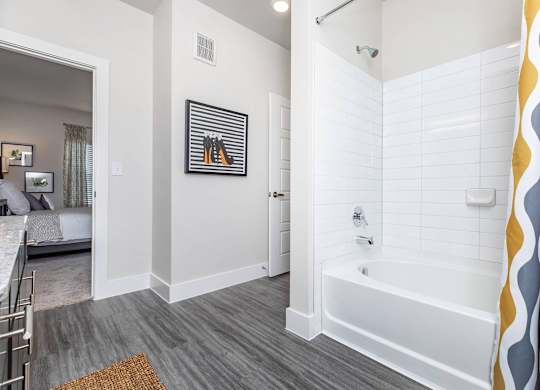 Bathroom with white subway tile and modern fixtures at Sienna at Westover Hills Apartments, Texas