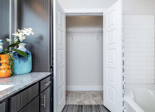 Walk-in closet with wire shelf and carpeted floor at Sienna at Westover Hills Apartments, San Antonio, TX