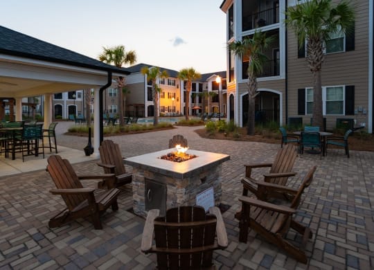 Outdoor Grilling and Entertainment Area at Abberly Crossing Apartment Homes by HHHunt, Ladson, SC, 29456
