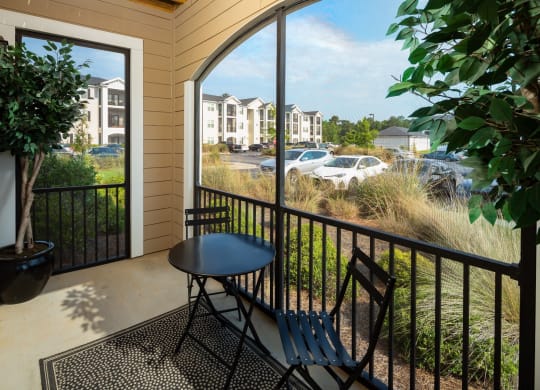 Private Balcony With Seating at Abberly Crossing Apartment Homes by HHHunt, Ladson, 29456