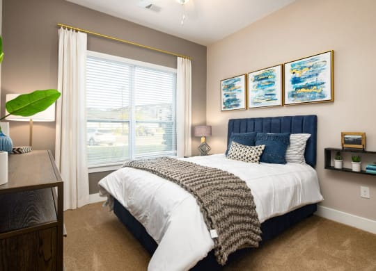 Beautiful Bright Bedroom With Wide Windows at Abberly Solaire Apartment Homes, Garner, NC, 27529