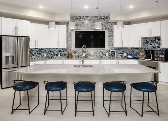 Clubhouse Kitchen Breakfast Bar with Stools at Abberly Solaire Apartment Homes, Garner, North Carolina