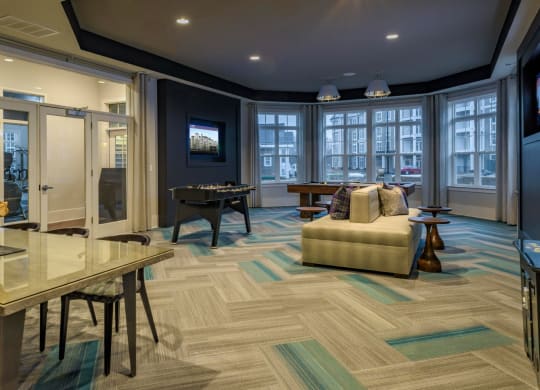 Game Room with Foosball Table at Abberly at Southpoint Apartment Homes by HHHunt, Fredericksburg, 22407