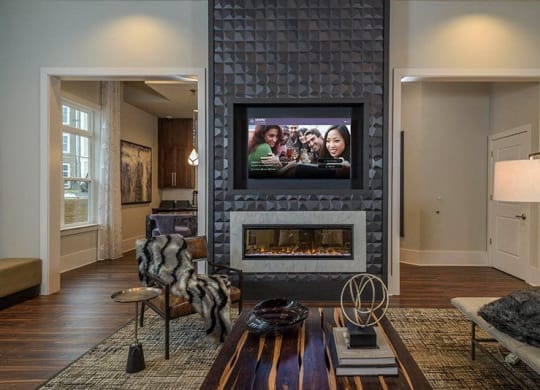 Club Room With Standard Fireplace at Abberly at Southpoint Apartment Homes by HHHunt, Virginia, 22407