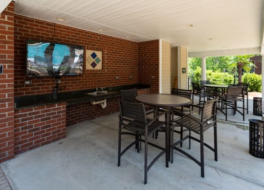 Shaded Outside Sitting Area at Abberly Village Apartment Homes by HHHunt, West Columbia, SC, 29169