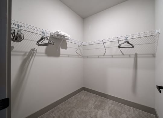 a walk in closet in a bedroom plus den unit at the casey, 2100 delgan at Abberly Foundry Apartment Homes, Nashville