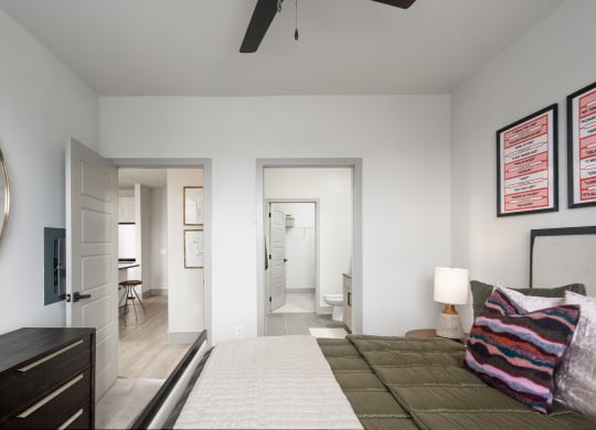 a bedroom with a large bed and a ceiling fan at Abberly Foundry Apartment Homes, Nashville, TN