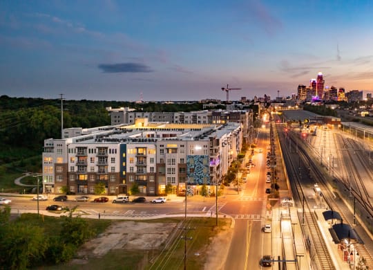 an aerial view of a city at night  at Abberly Noda Vista Apartment Homes, North Carolina