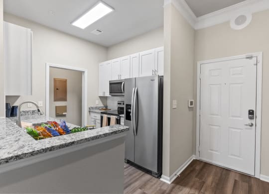 a kitchen with stainless steel appliances at West Ashley Apartment Homes, Charleston, South Carolina