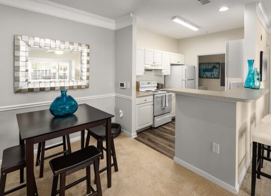 Dining Area and Kitchen at Abberly Woods Apartment Homes, Charlotte, North Carolina