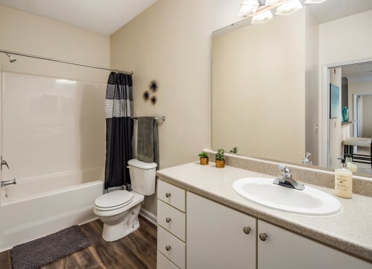 White on White Bath Cabinetry at Abberly Woods Apartment Homes, Charlotte, NC