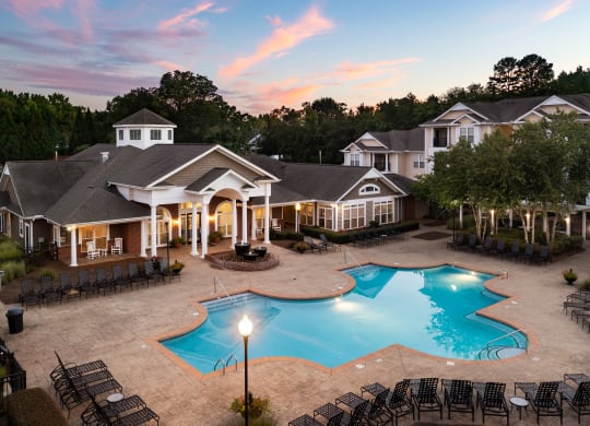Outdoor Pool During Dusk at Abberly Woods Apartment Homes, Charlotte, North Carolina