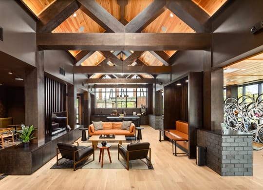 a living room filled with furniture and a large window  at Abberly Riverwalk Apartment Homes, Tennessee, 37228